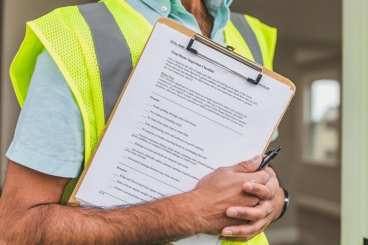 A clipboard being used during a property assessment