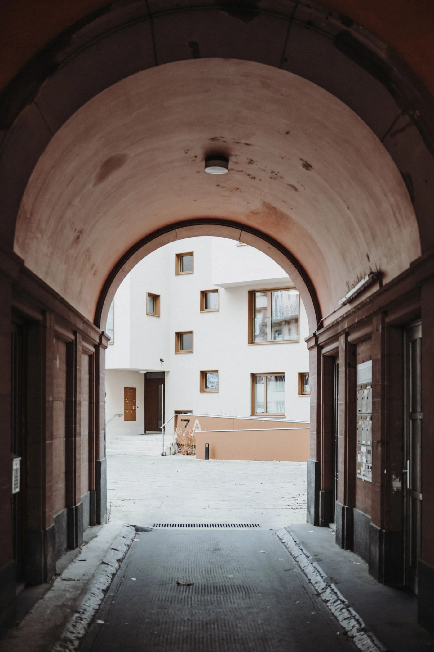An archway connecting residential buildings