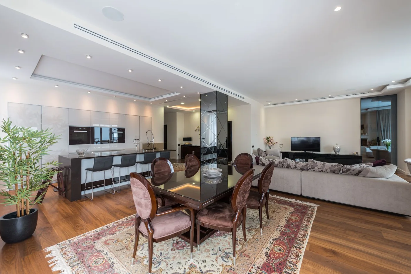 A spacious home with connected living and dining areas